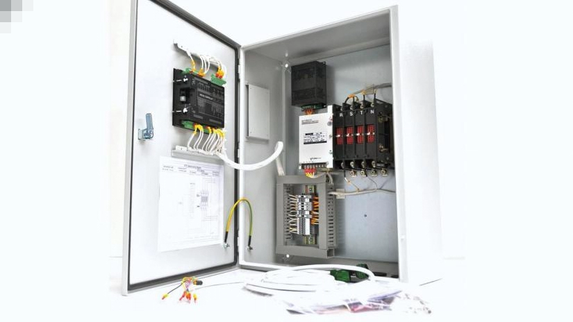 A picture of a white transfer switch.