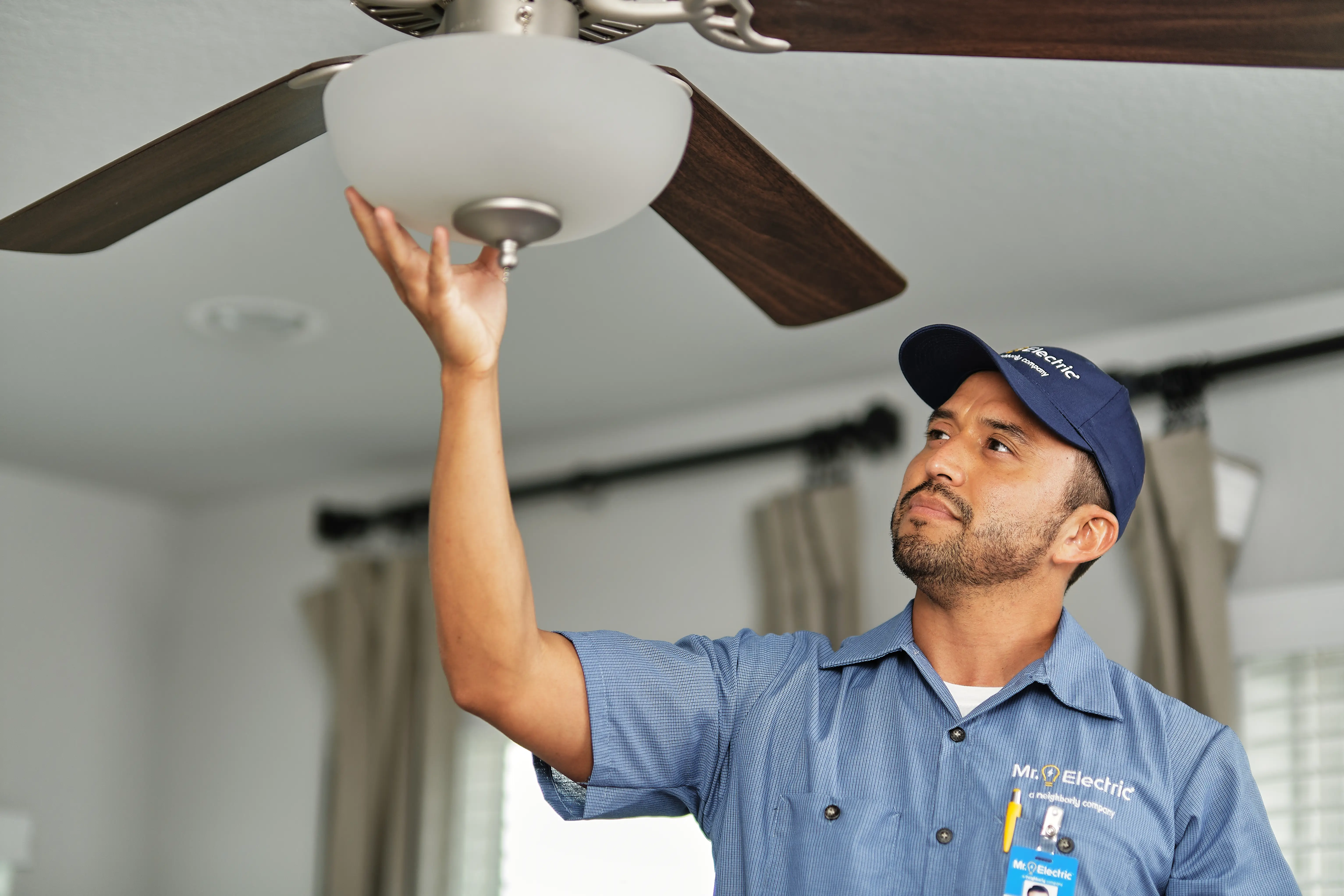 MRE electrician with ceiling fan.