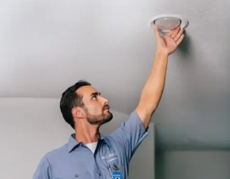 Mr. Electric technician installing LED lights.