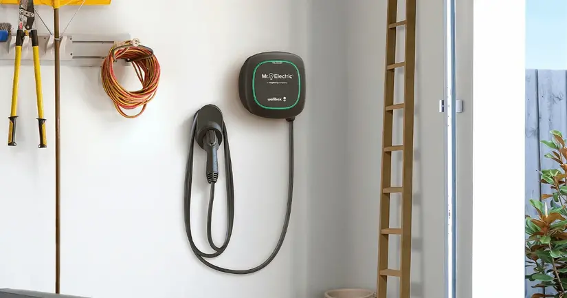 EV charger installed on garage wall