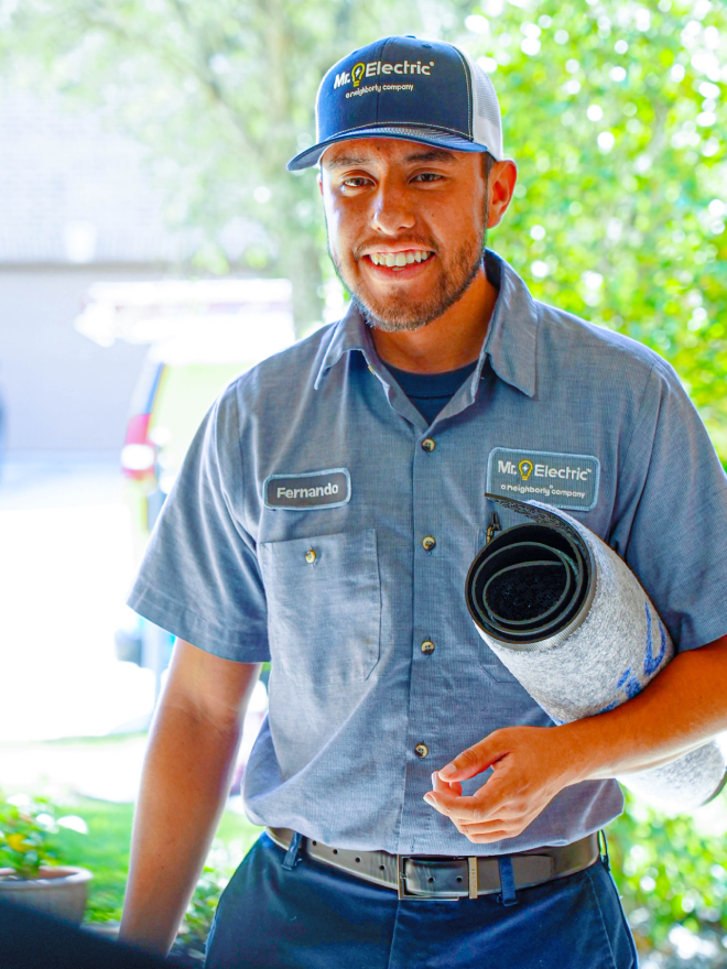 Mr. Electric electrician arriving to install a 240-volt appliance outlet.