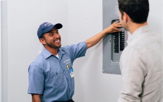 Mr. Electric electrician explains commercial panel upgrading to customer
