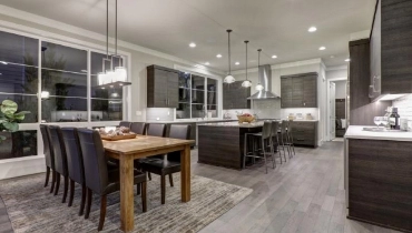 Kitchen and dining area of a luxury home with an an open floor plan