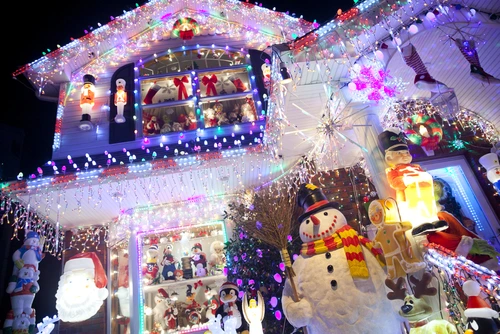 House exterior with extravagant Christmas decor.
