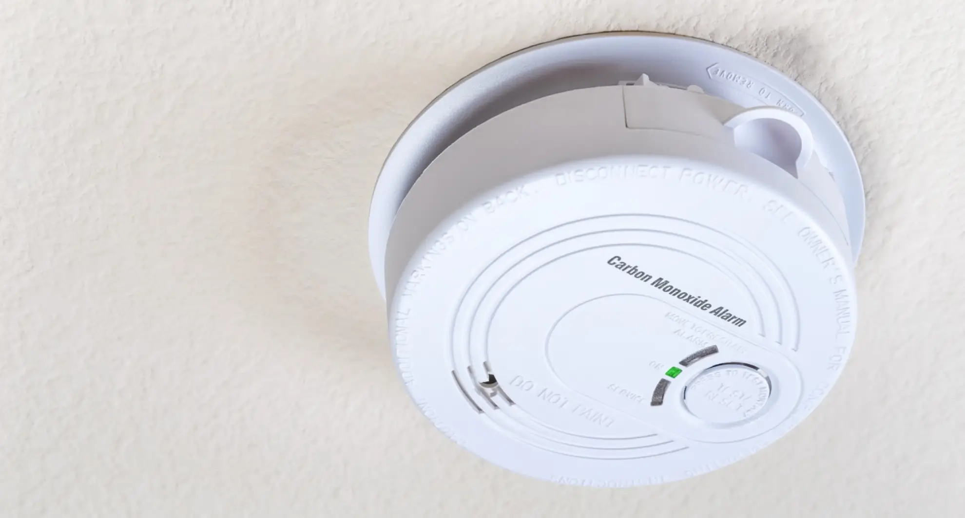Close-up of carbon monoxide alarm on ceiling