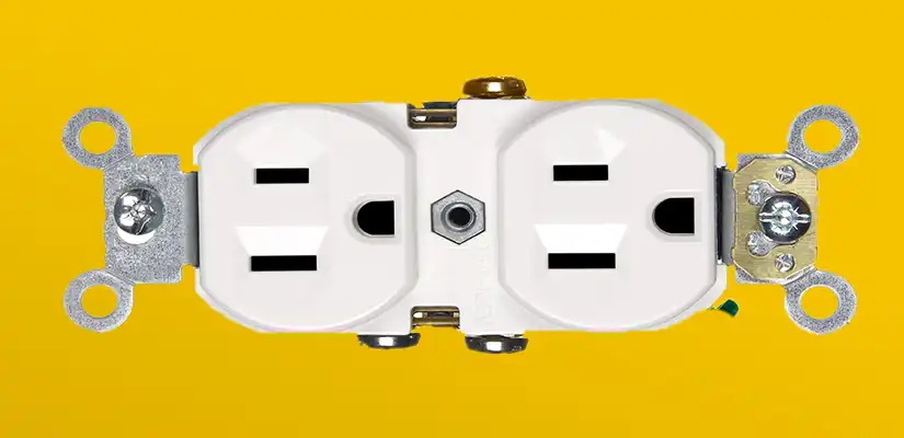 A white three-prong duplex outlet on a yellow background.