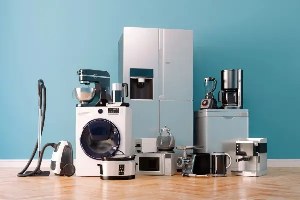 Collection of various home appliance against a blue background.